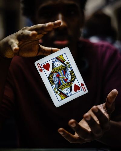 magic (illusion); conjuring; magic trick; conjuring trick; sleight of hand — 手品